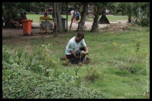Planting a Tree in memory of the dead, The Killing Fields, Phnom Penh, Cambodia