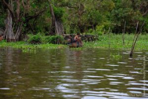 A villager, At the Floating village at Kampong Phluk, Cambodia 