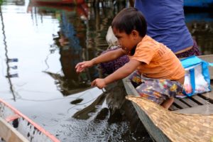 A villager, At the Floating village at Kampong Phluk, Cambodia 