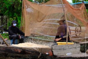 Fishermen, Floating village at Kampong Phluk, Cambodia