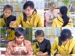 Choosing some new glasses in Hoi An
