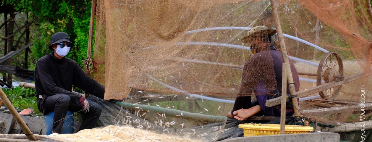 Fishermen, Floating village at Kampong Phluk, Cambodia